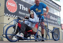 Graham plans to push a wheelchair for 37.73 miles