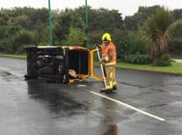 Van overturns near airport