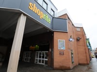 Call to drop debate on scrapping work permits after Shoprite takeover
