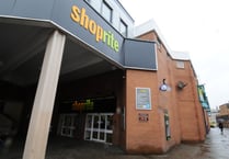 Call to drop debate on scrapping work permits after Shoprite takeover