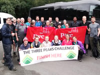 Workmates climb three highest peaks