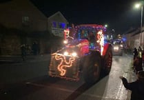 Tractor run lights up Christmas - video