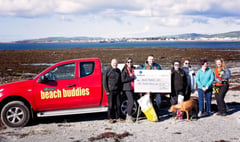 Zurich staff raise money for Beach Buddies