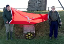 Reduced crowd commemorates Dhone