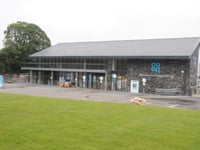 Former Co-op boss denies immigration law breaches