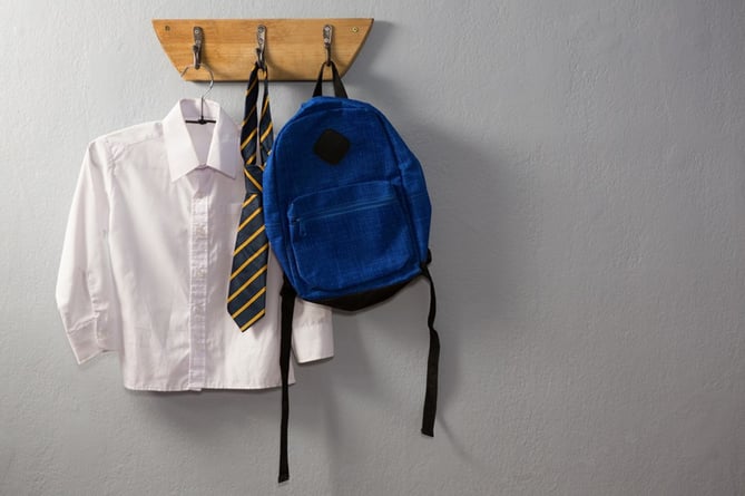 A school uniform and bag.