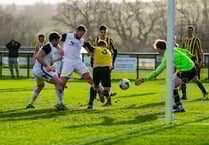 Champions dent Rushen's title hopes
