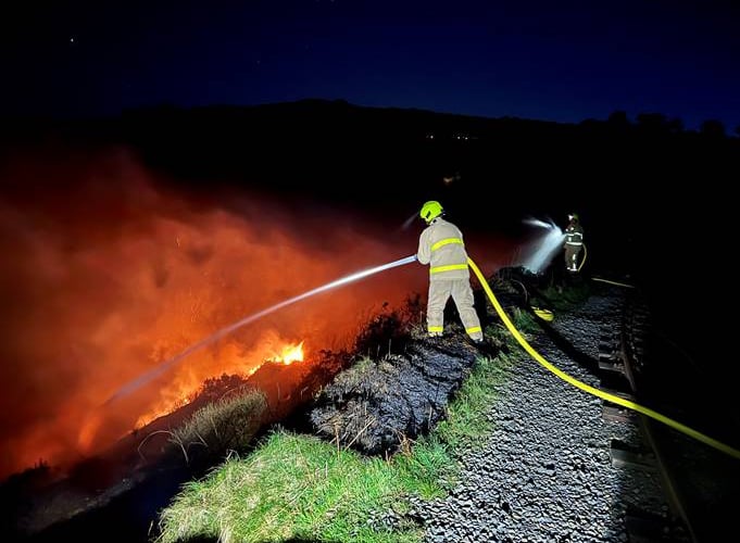 Firefighters tackling the blaze in Groudle