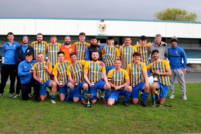 St John’s United celebrate with the Combination Two trophy (Photo: Paul Hatton)