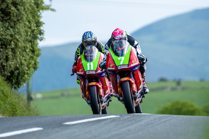 Gary Johnson leads his Dafabet Racing team-mate Rob Hodson during practice