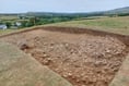 Cairn is beginning to emerge at archaeological dig site