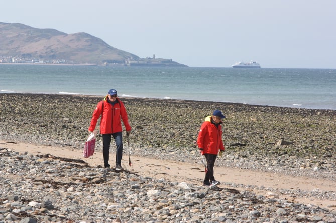 Cruise passengers off the boat Hurtigruten on a previous beach clean with Beach Buddies held in Castletown 