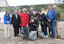 Wheelchair to help children to go on beach