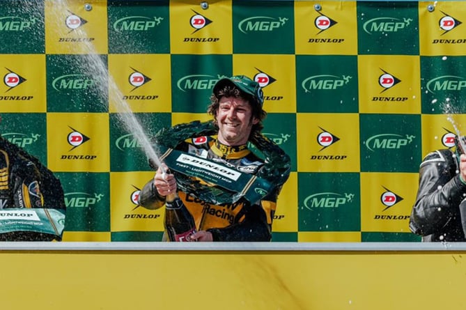 Mike Browne after victory in the Lightweight Manx Grand Prix