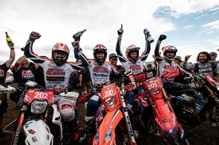 The Great Britain team celebrate their historic World Trophy Team success in the International Six Days Enduro on Saturday afternoon. (Left to right) Jed Etchells, Steve Holcombe, Nathan Watson and Jamie McCanney      
