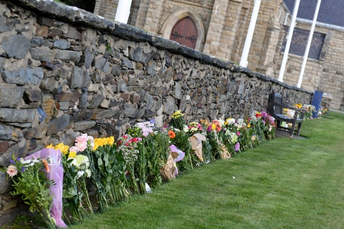 Flowers placed on the processional walkway at Tynwald Hill in St John's to mark the death of Queen Elizabeth II, Lord of Mann - 