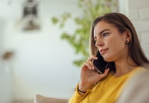 Freephone number to talk about living costs