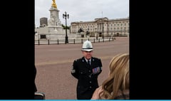 Manx white police helmet stands out in London