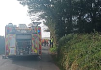 Vehicle ends up on its side in Bride