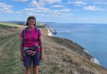 Sue raises £3,000 for the RNLI in 630-mile coast walk