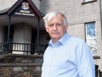 Commissioner denies assault after meeting row