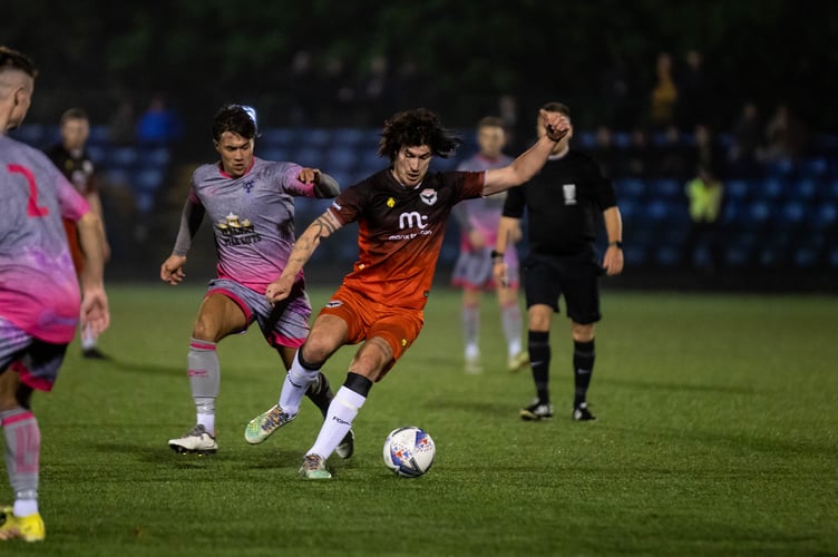 FC Isle of Man’s Mike Williams in action against Northwich Victoria 