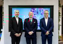 Governor tours telecom