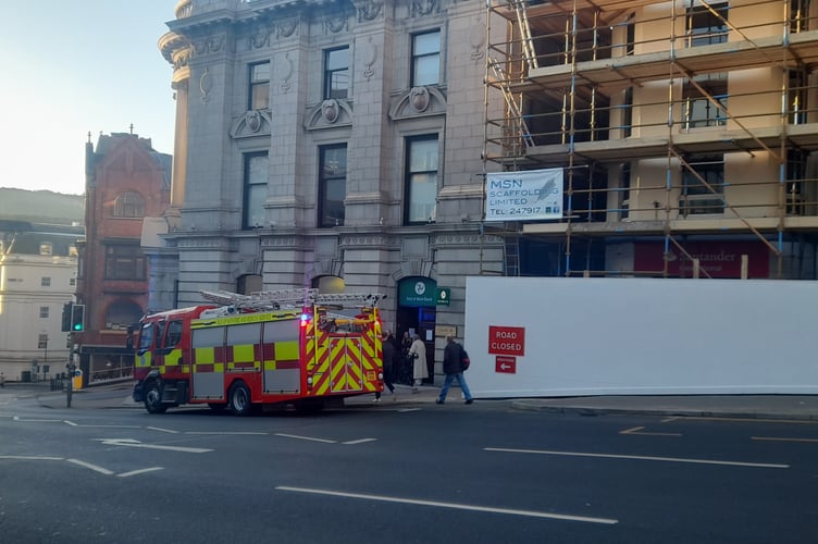 A fire engine outside of a bank