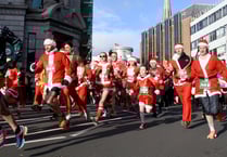 Video: Nearly 200 tackle Santa Dash