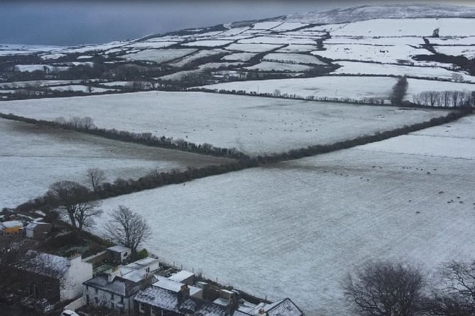 Snow over fields in Kirk Michael