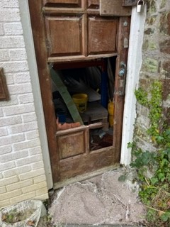 Damaged door in Laxey