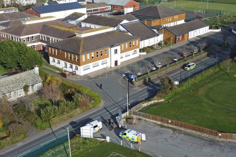 27/3/2023: Police presence outside Queen Elizabeth II High School in Peel. PICTURE BY DAVE KNEEN.