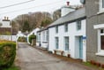 Riverside cottage for sale could be one of the "cutest on the island"