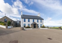 Farmhouse for sale comes with 22 acres and its own bar