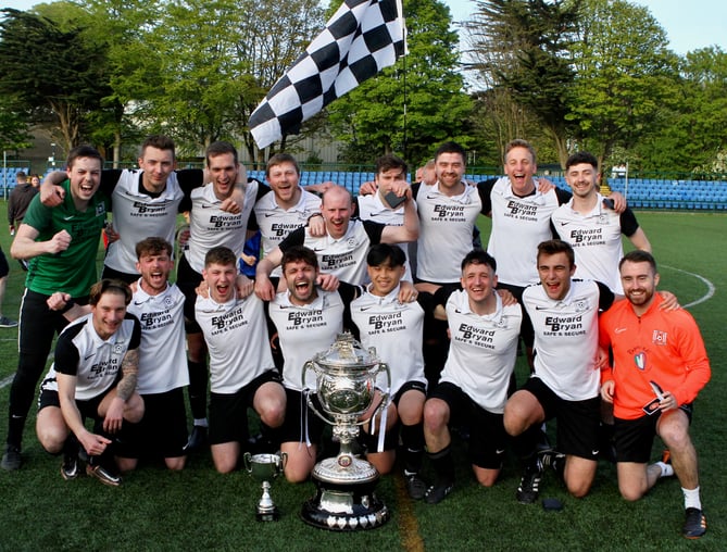 Corinthians celebrate winning the Dixcart Railway Cup after beating Peel in the final at the Bowl