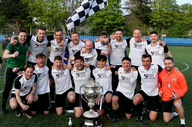 Corinthians celebrate winning the Dixcart Railway Cup after beating Peel in the final at the Bowl