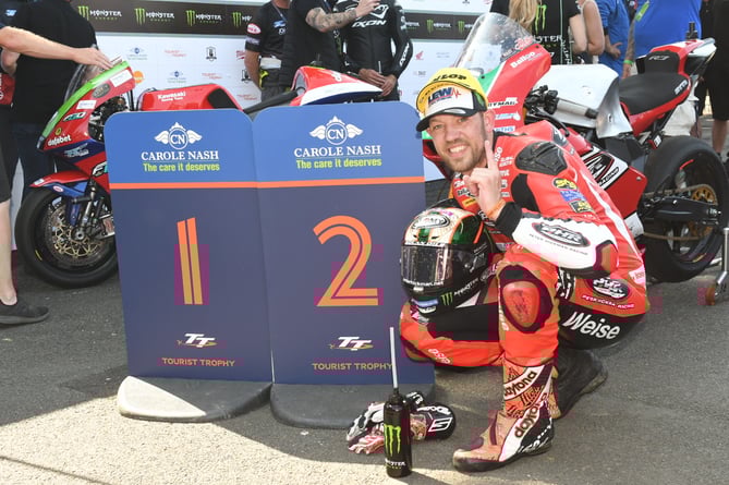 Peter Hickman celebrates winning the second Supertwin race of TT 2023