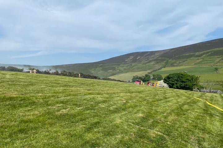 Fire services dealing with a wildfire in Greeba on Saturday