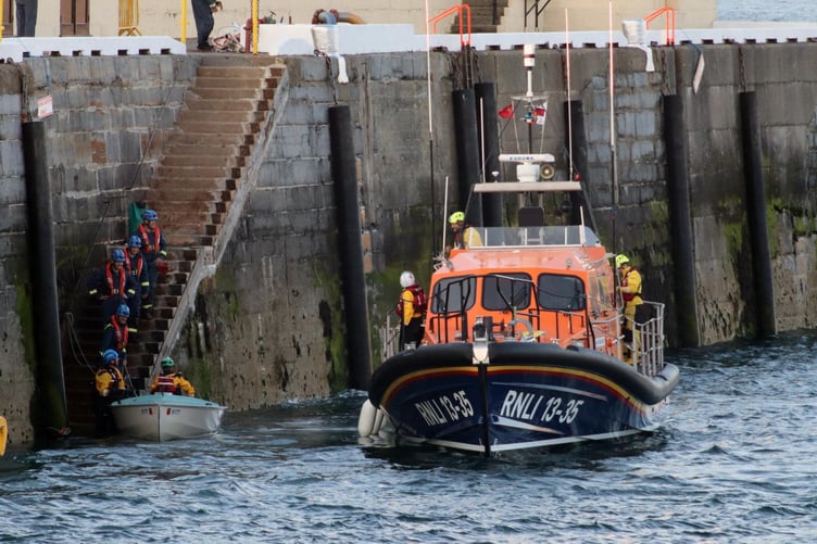 Lifeboat 'Frank and Brenda Winter' and her volunteer crew returned the dinghy to its upright position in Peel Bay