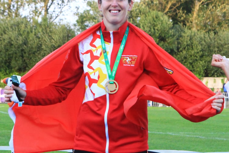 Rachael Franklin on the podium with her gold medal