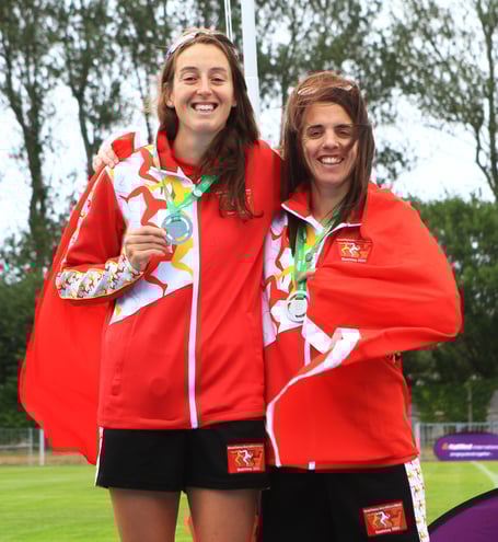 Rachael Franklin (left) and Rebekah Pate with their half-marathon team gold medals