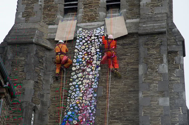 Nine members of Laxey Mines Research Group installed the new flower tower at St Thomas’ Church in Douglas