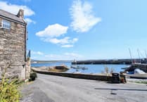 Period cottage for sale sits on harbourside with "stunning" views and a building plot