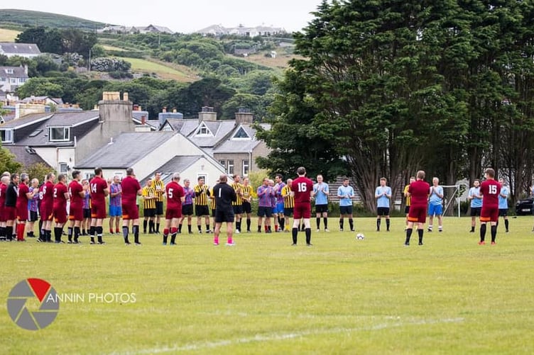 A minutes applause ahead of the first Jukes Memorial Match in 2021.