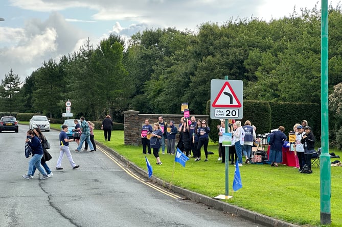Nurses gathered outside Noble's Hospital this morning before moving down to the roundabout A23 road 