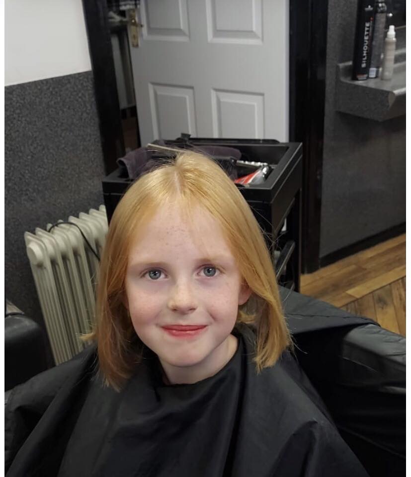 Seven-year-old donates her hair to charity
