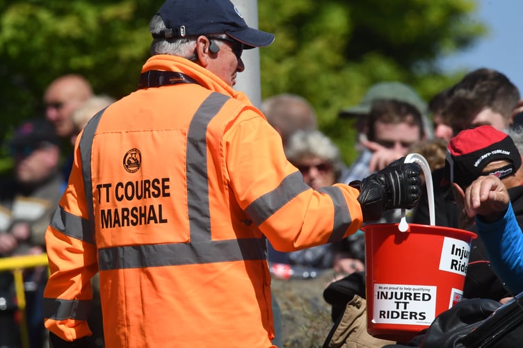 TT 2022 - race marshals raising money for injured riders