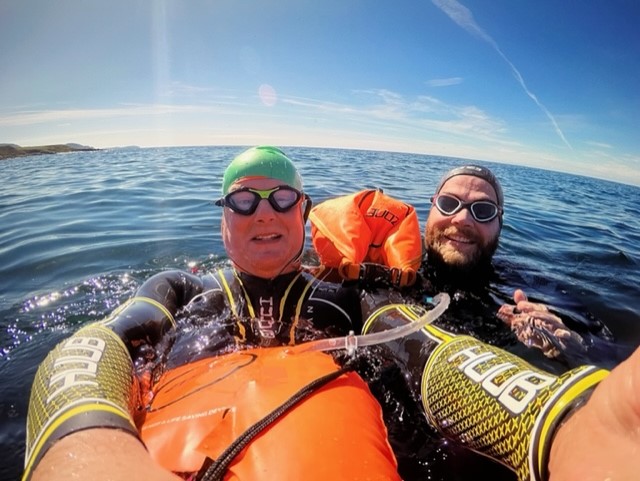 Pair complete charity swim against suicide