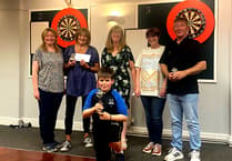Doreen Kneen darts competition raises £1,000