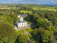 Georgian estate for sale comes with a tennis court, a lake and a gym